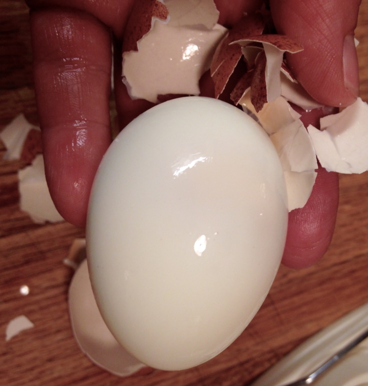 Pealed fresh egg