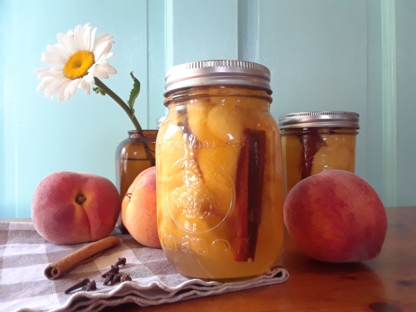 Canned Pickled peaches with Shasta Daisy